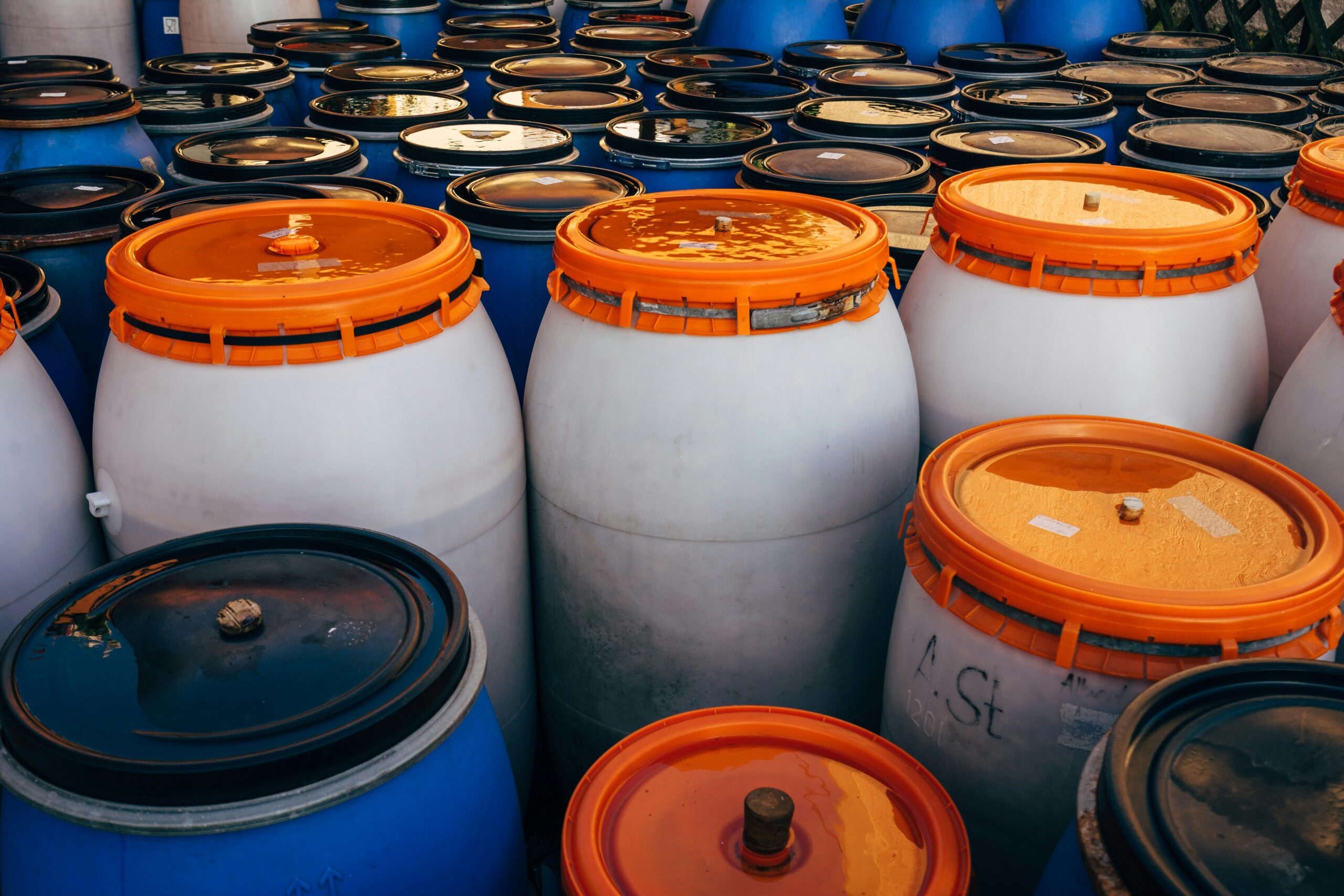chemical containers used on an industrial site, generating hazardous waste