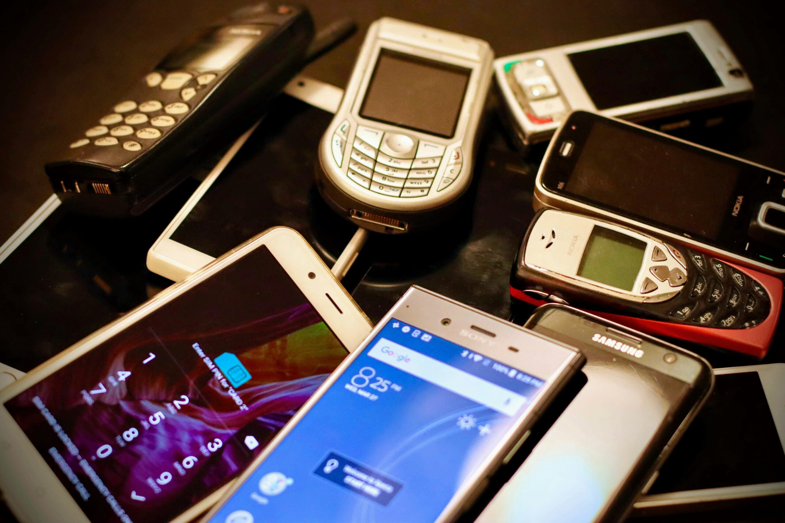 A pile of mobile phones ready for secure production destruction