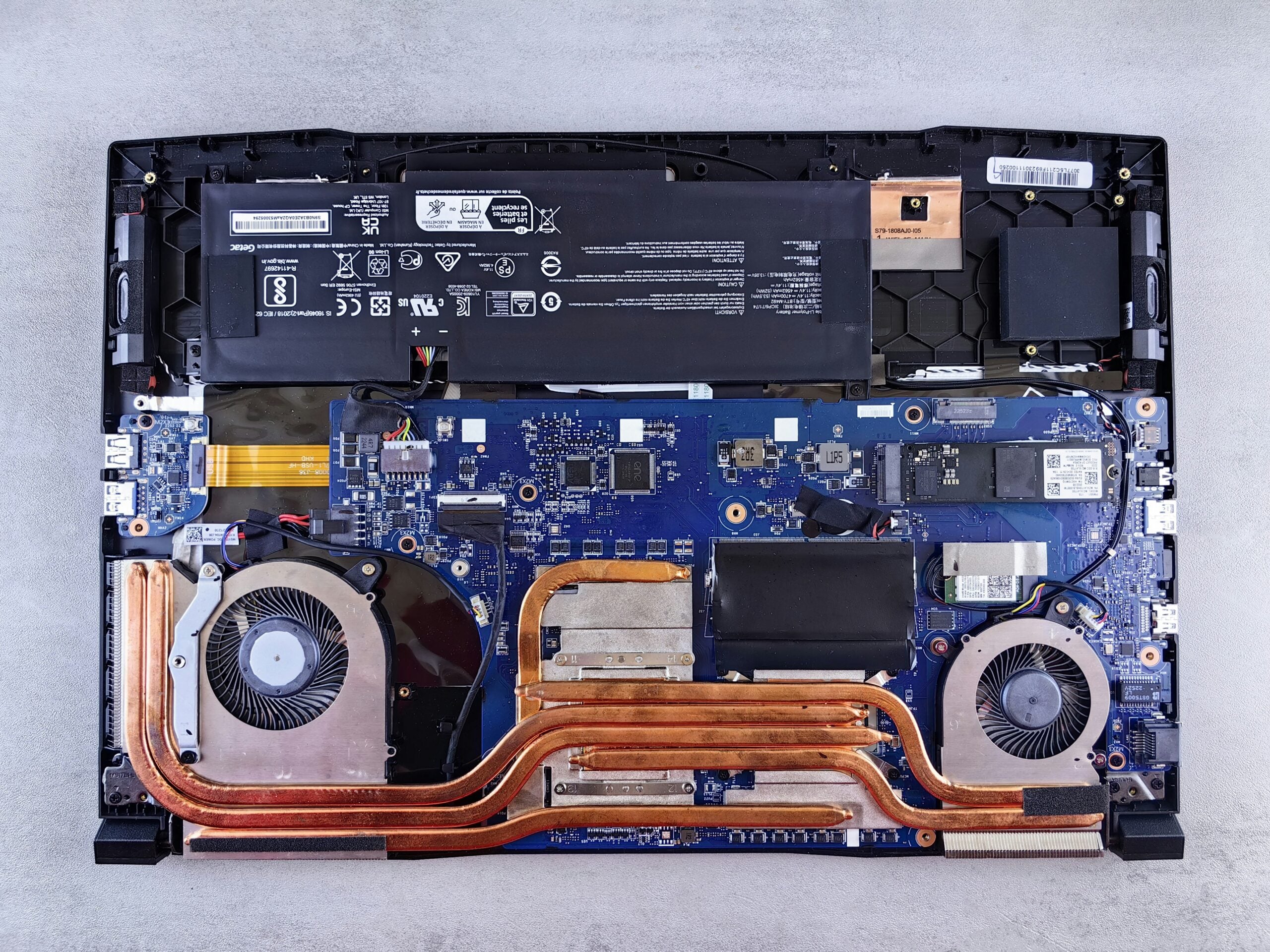 A laptop being dismantled in preparation for the disposal of lithium batteries
