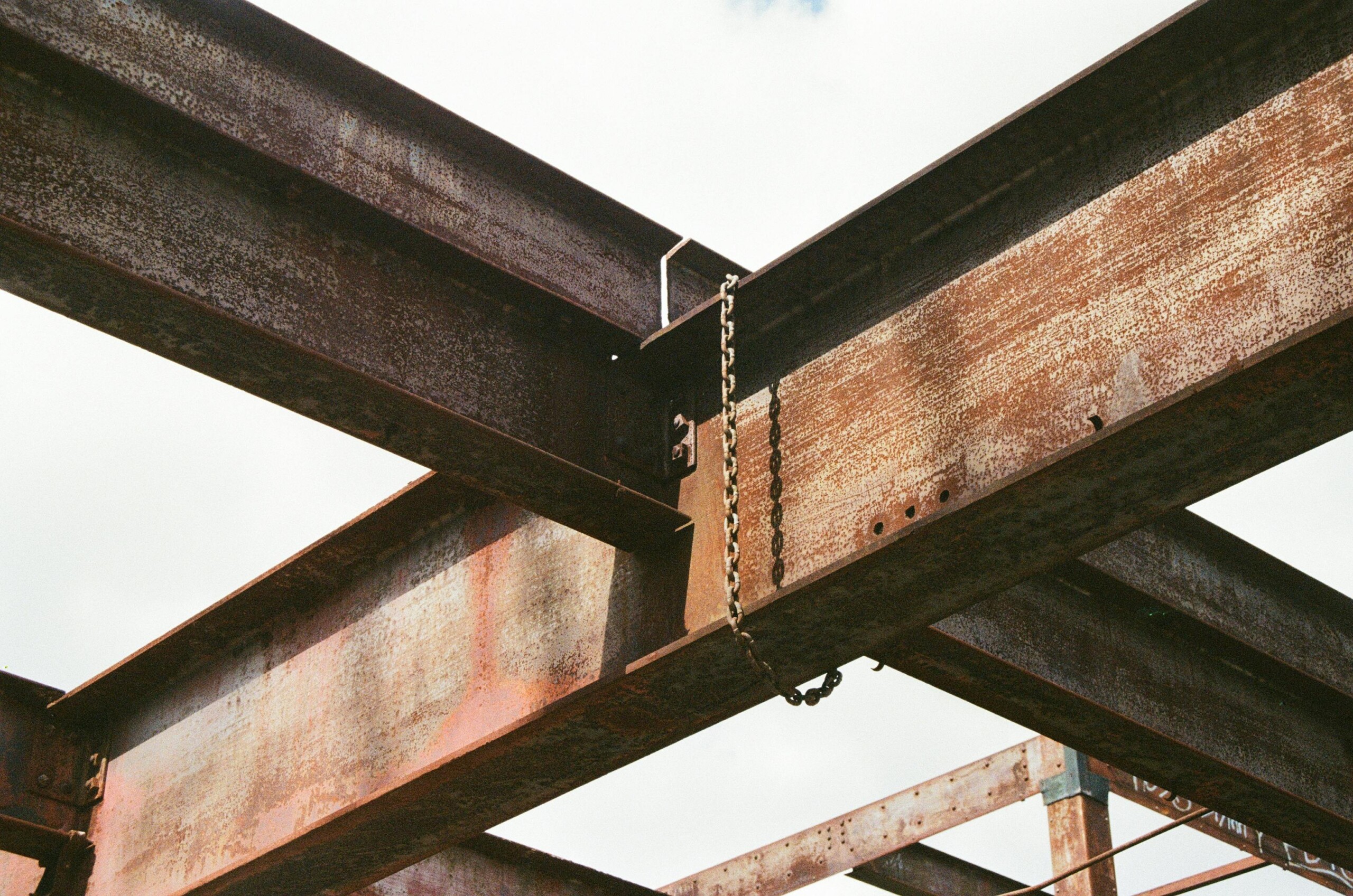 Metal beams showing signs of wear ready for metal recycling