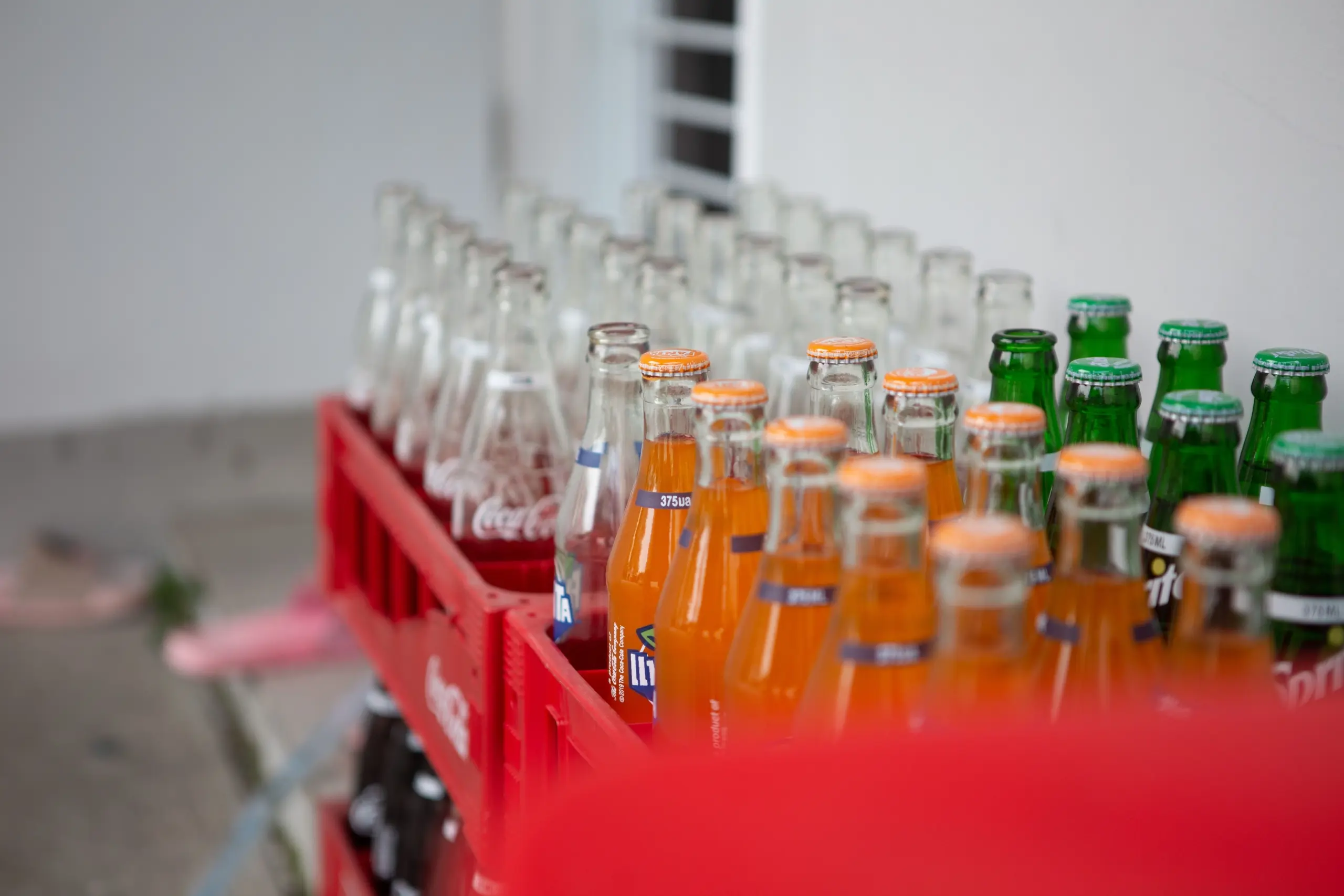 New glass bottles that have been made using a closed loop recycling system